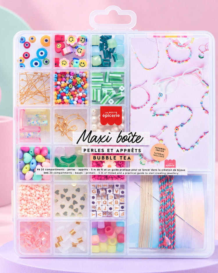 Boîte de perles colorées avec divers apprêts pour bijoux