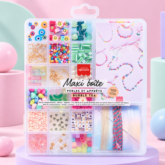Boîte de perles colorées avec divers apprêts pour bijoux