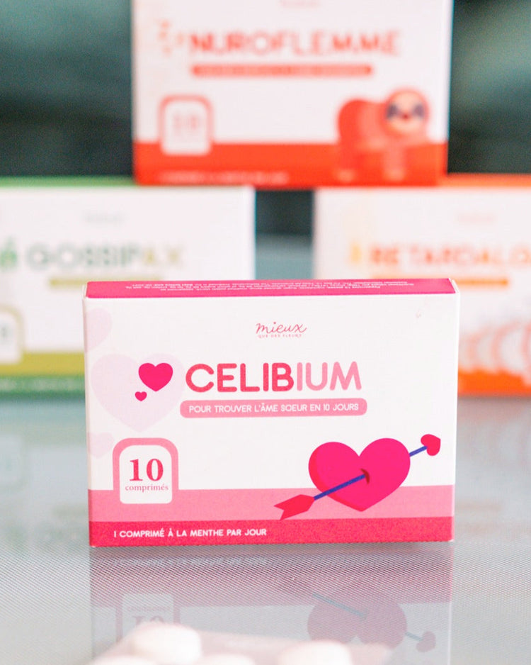 Boîte de comprimés humoristiques avec Cupidon en illustration.