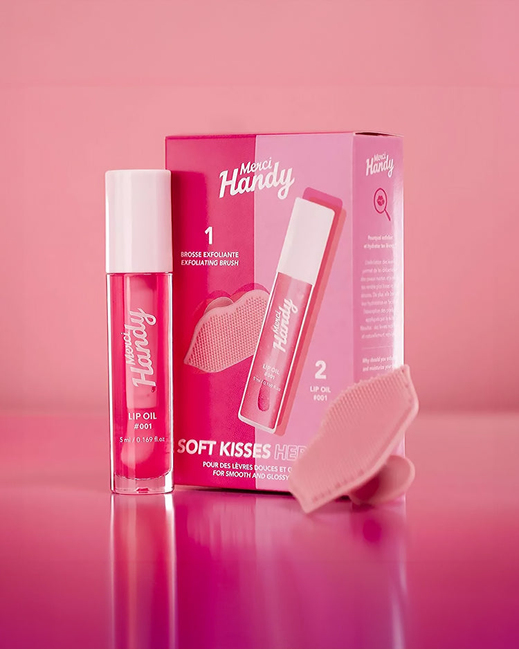 Coffret Lip Glow avec brosse exfoliante et baume à lèvres glossy.