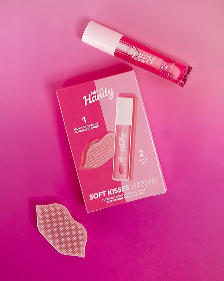 Coffret Lip Glow avec brosse exfoliante et baume à lèvres glossy.