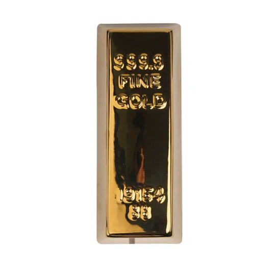 Vue de dessus de la tirelire lingot d'or brillante