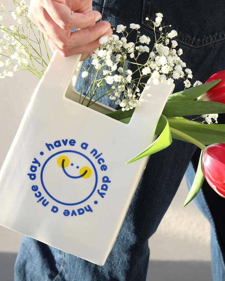 Vase en forme de sac de shopping avec motif smiley
