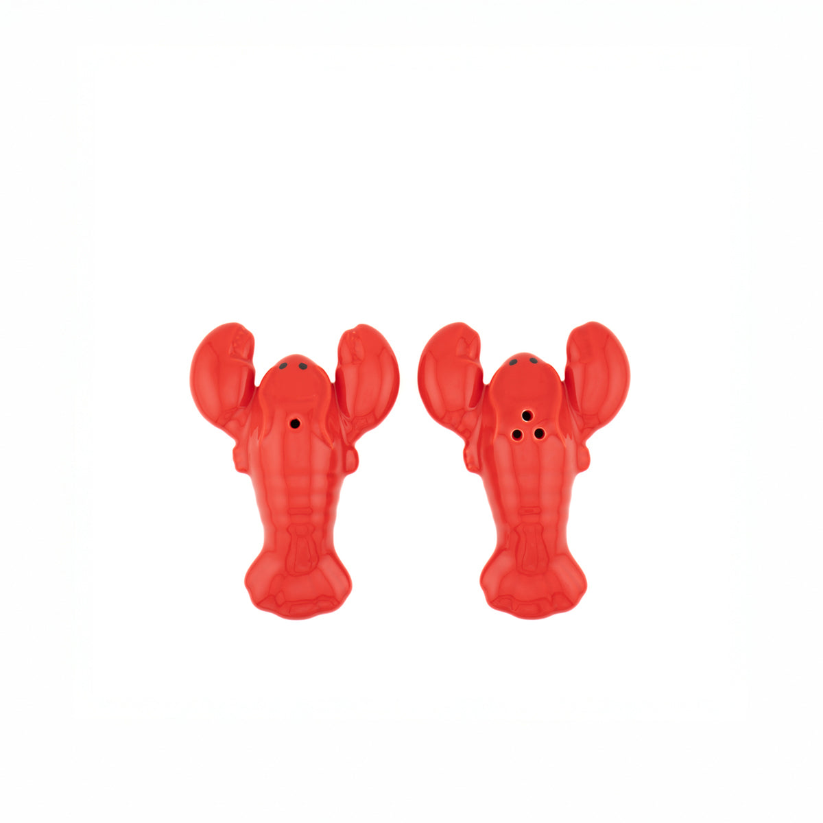 Salière et poivrière en forme de homard sur fond clair