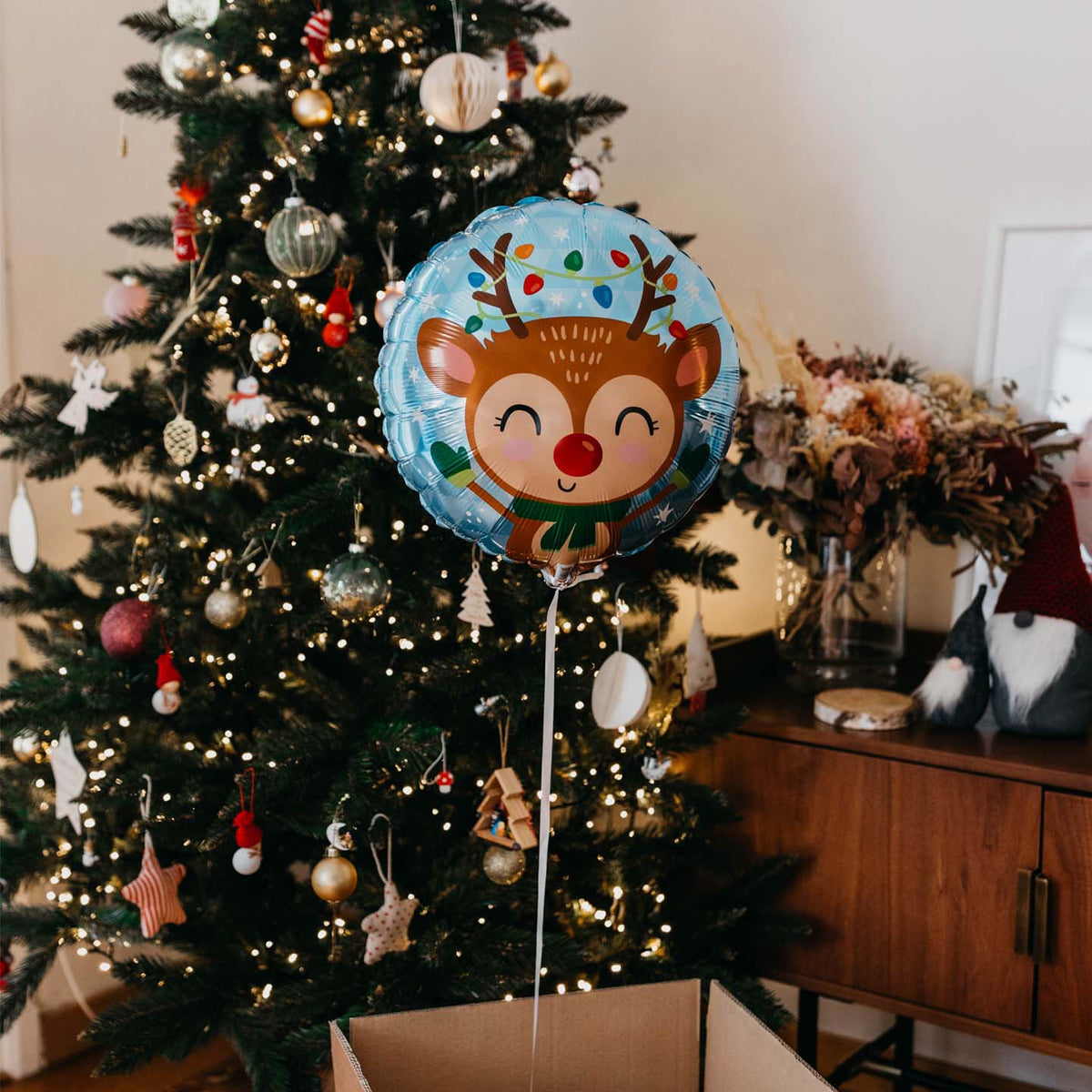 Ballon Renne de Noël avec motif de renne et flocons de neige.